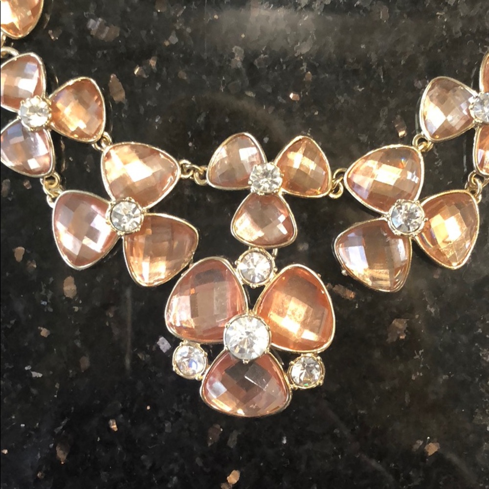 Gold flower necklace with stones